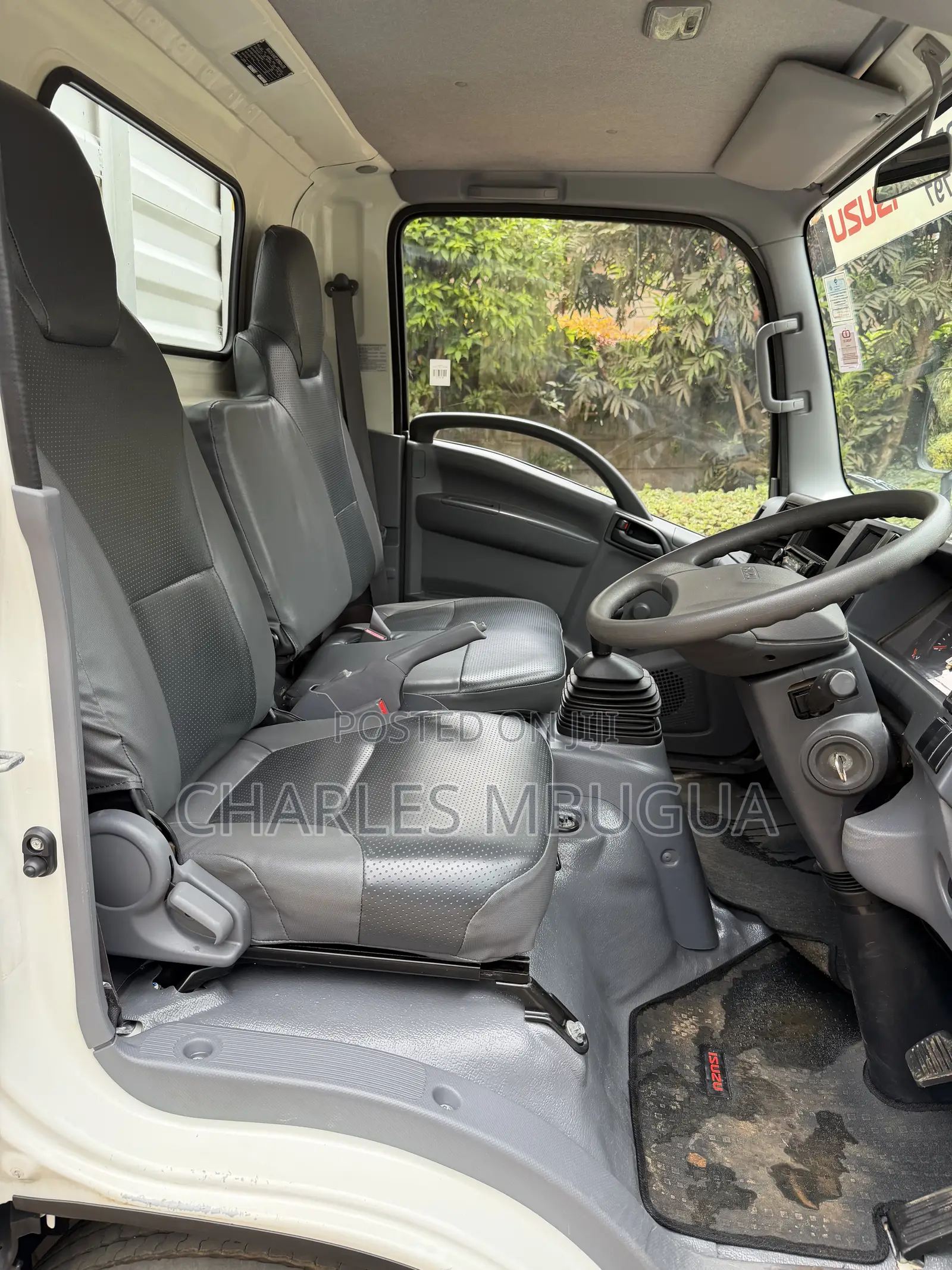 Isuzu NMR Bluepower 2024 White