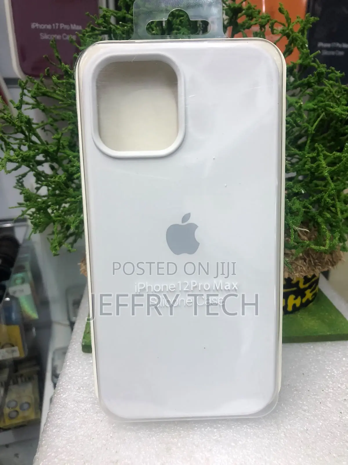 White Silicone Phone Case in a Clear Plastic for iPhone 12 Pro Max.
