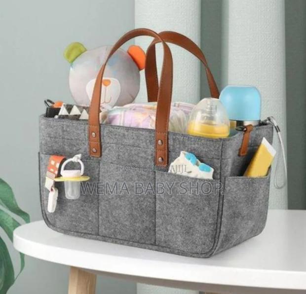 Baby Diaper Caddy/Organizer With Convenient Exterior Side Pockets.