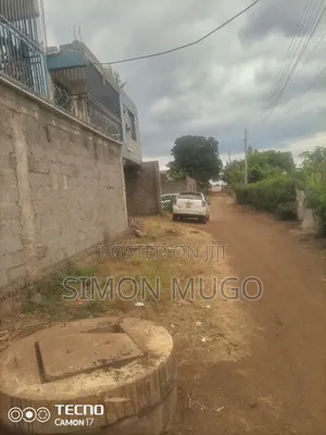Kenol Prime 50x100 Plot Behind Quiver Ideal for High Rise Apartments