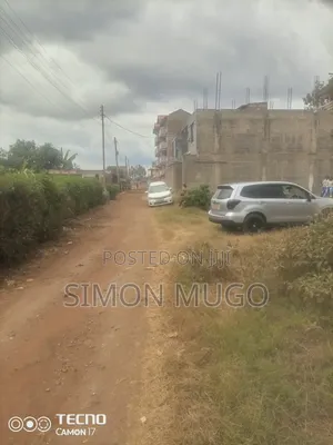 Kenol Prime 50x100 Plot Behind Quiver Ideal for High Rise Apartments