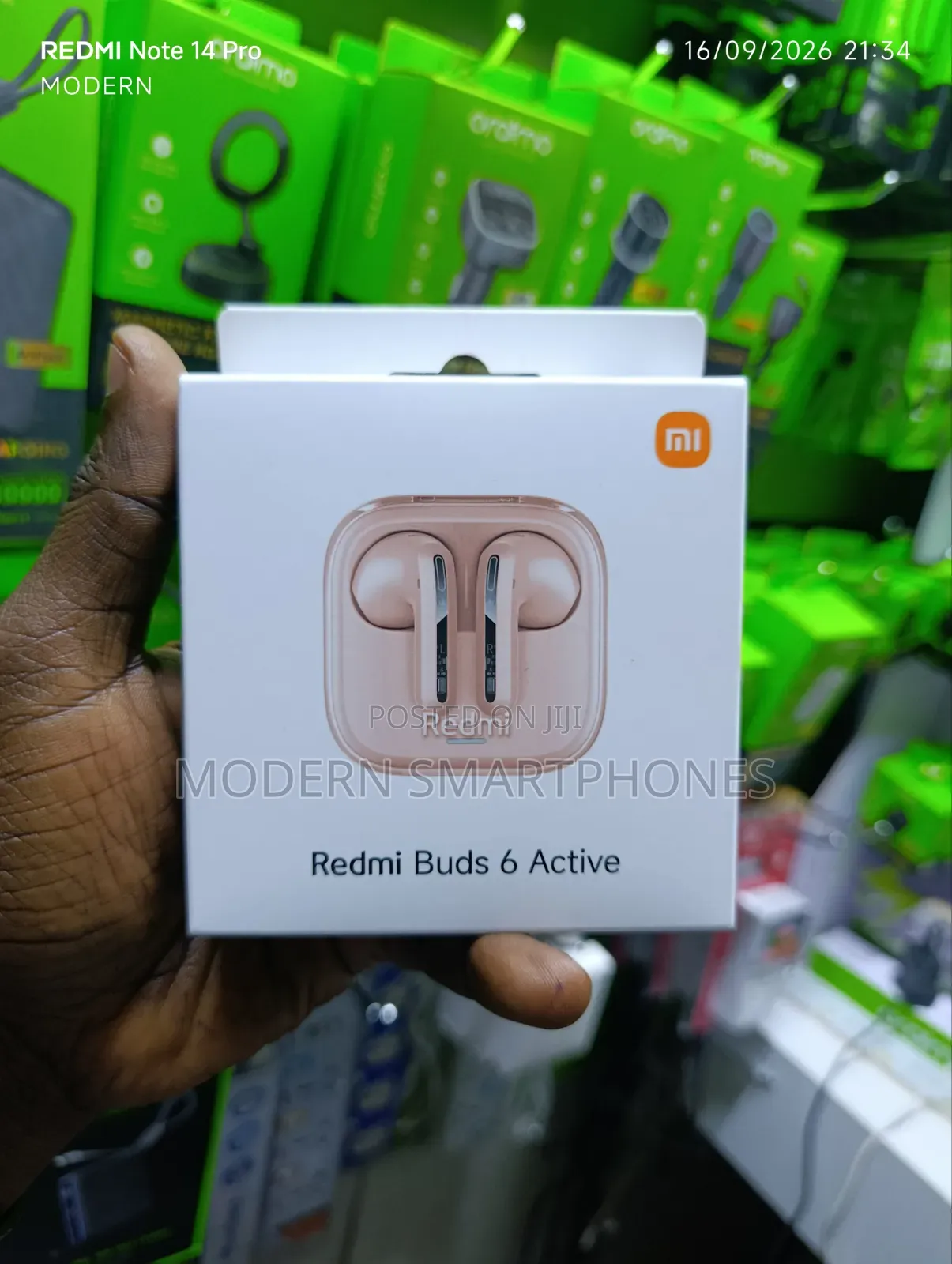 Xiaomi Redmi Buds 6 Active Wireless Earbuds in Pink.