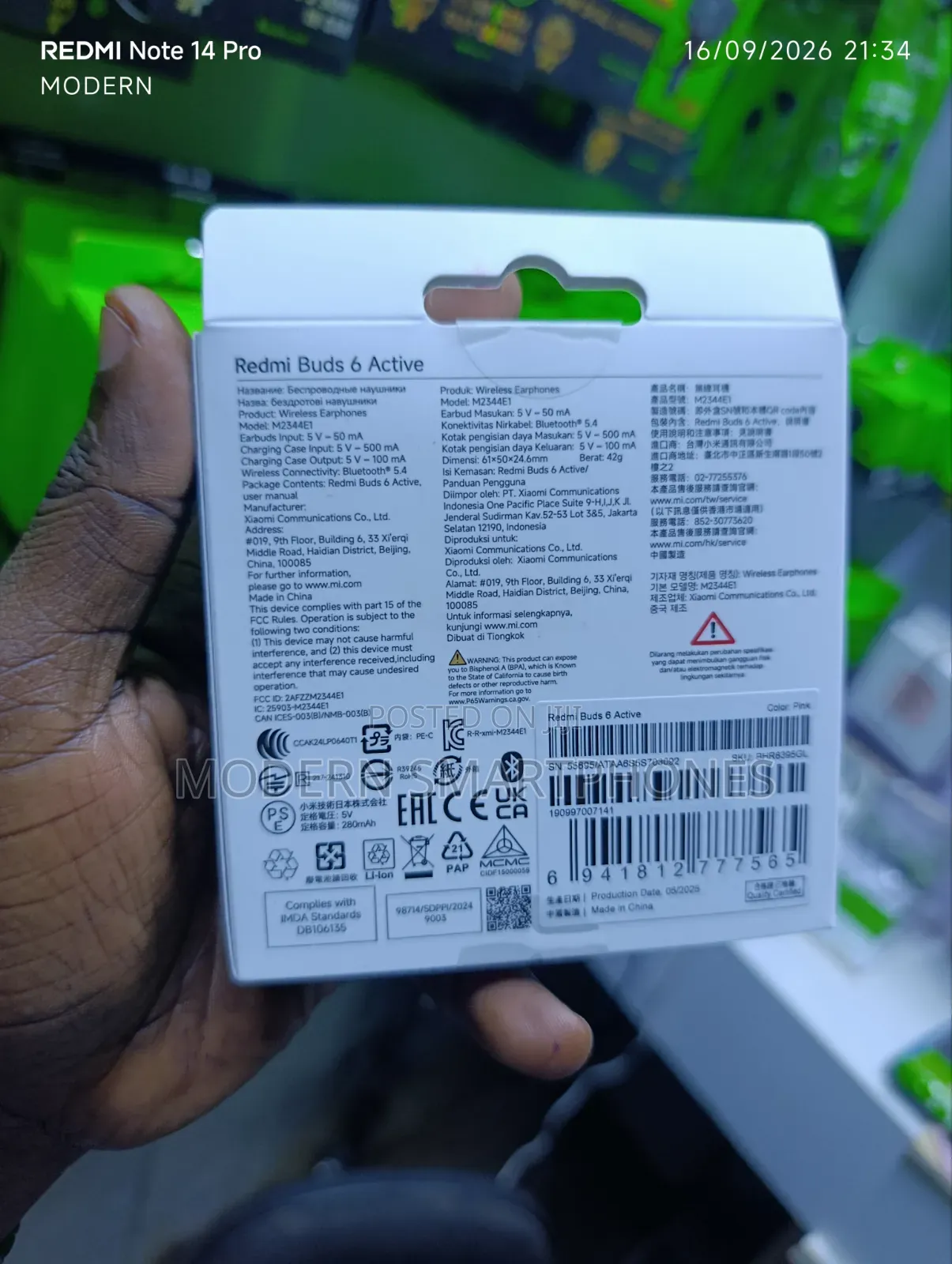 Xiaomi Redmi Buds 6 Active Wireless Earbuds in Pink.
