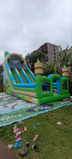 Large Inflatable Bouncing Castle With Slide – Kids’ Fun Events