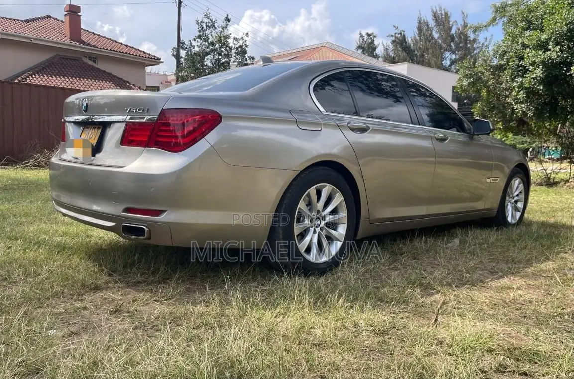 BMW 740 2011 Gold