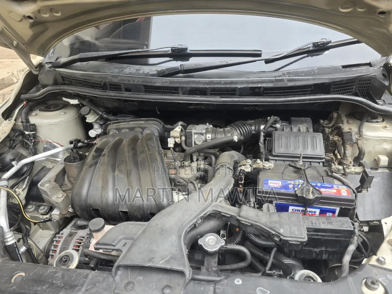 Nissan Tiida 2010 Gold