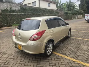 Nissan Tiida 2010 Gold