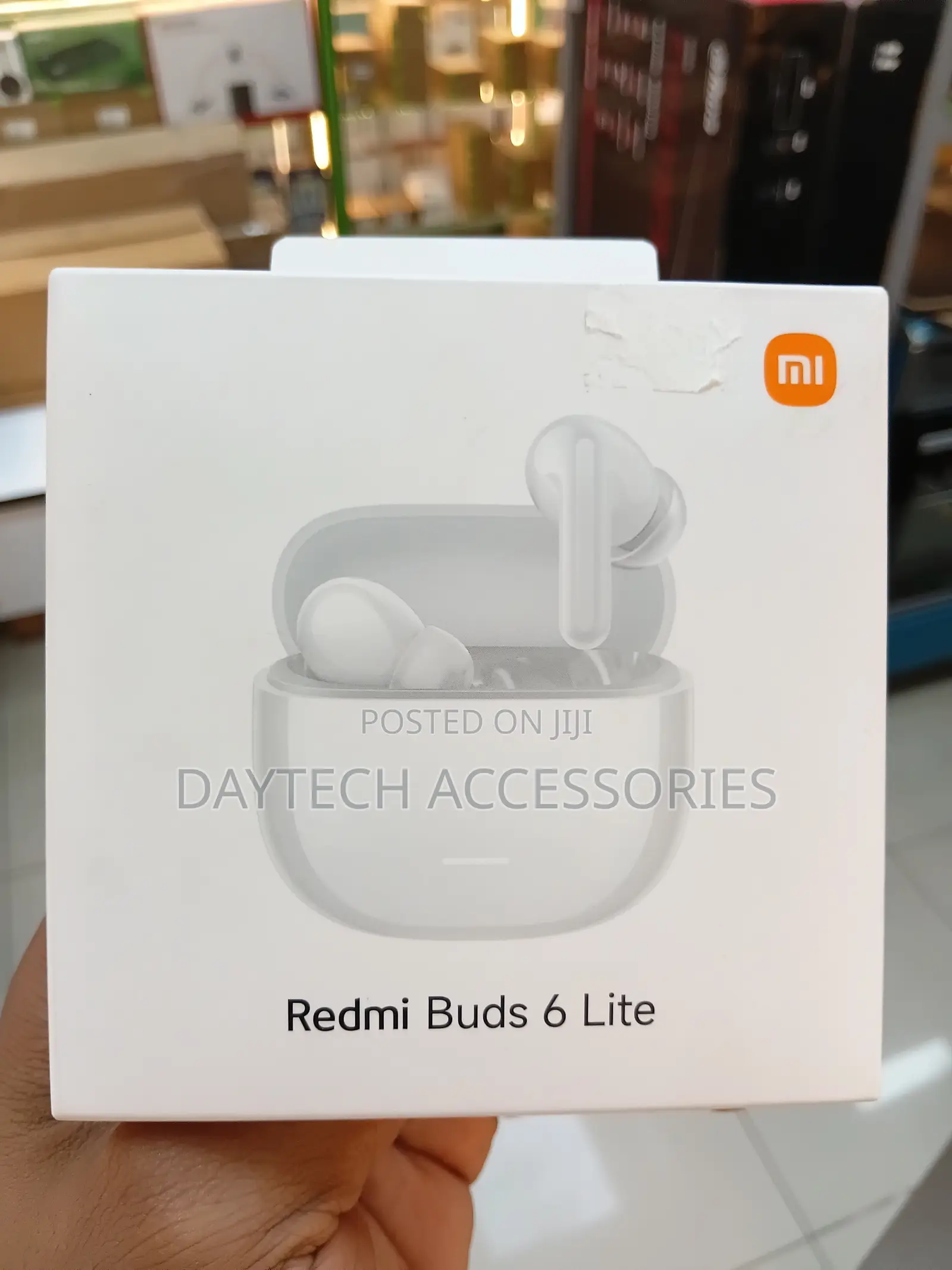 The Xiaomi Redmi Buds 6 Lite Wireless Earbuds in White.