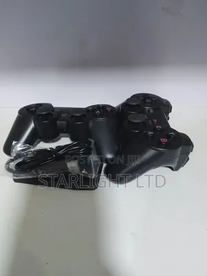 Retro Gaming on the Go: Dual-Controller Black Game Stick Setup