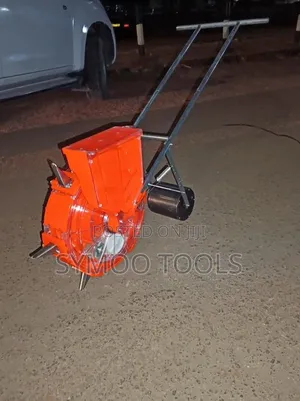 Manual Hand-Push Roller Seed and Fertilizer Planter