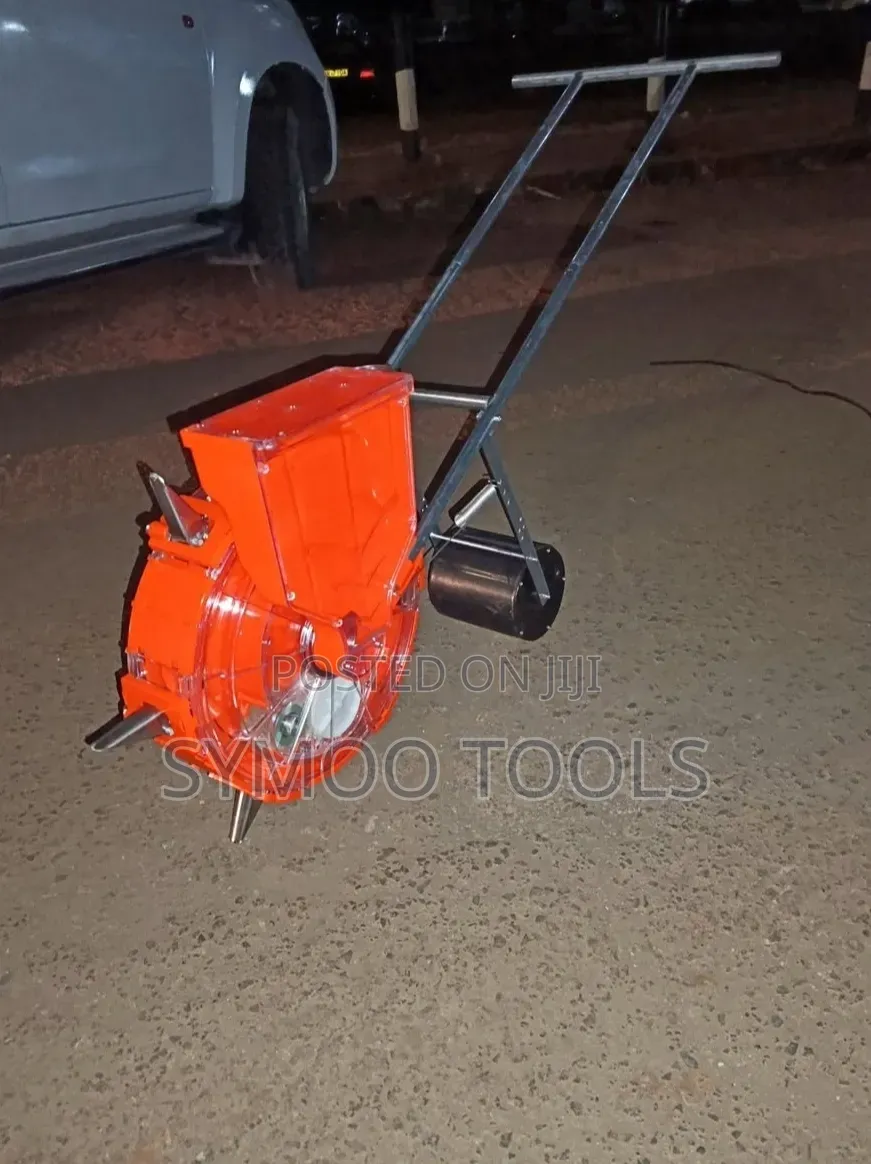 Manual Hand-Push Roller Seed and Fertilizer Planter