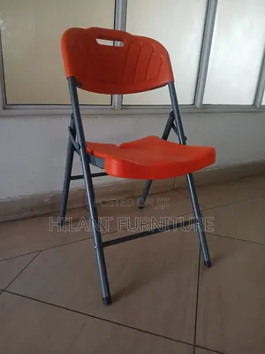 Elevate Plastic Orange Folding Chair