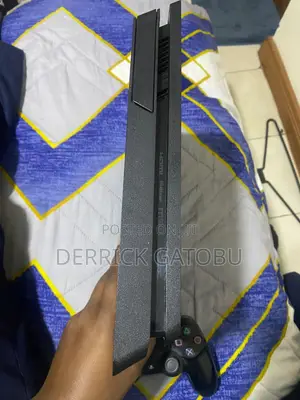 PS4 Slim 1TB Pre Owned and Slightly Used