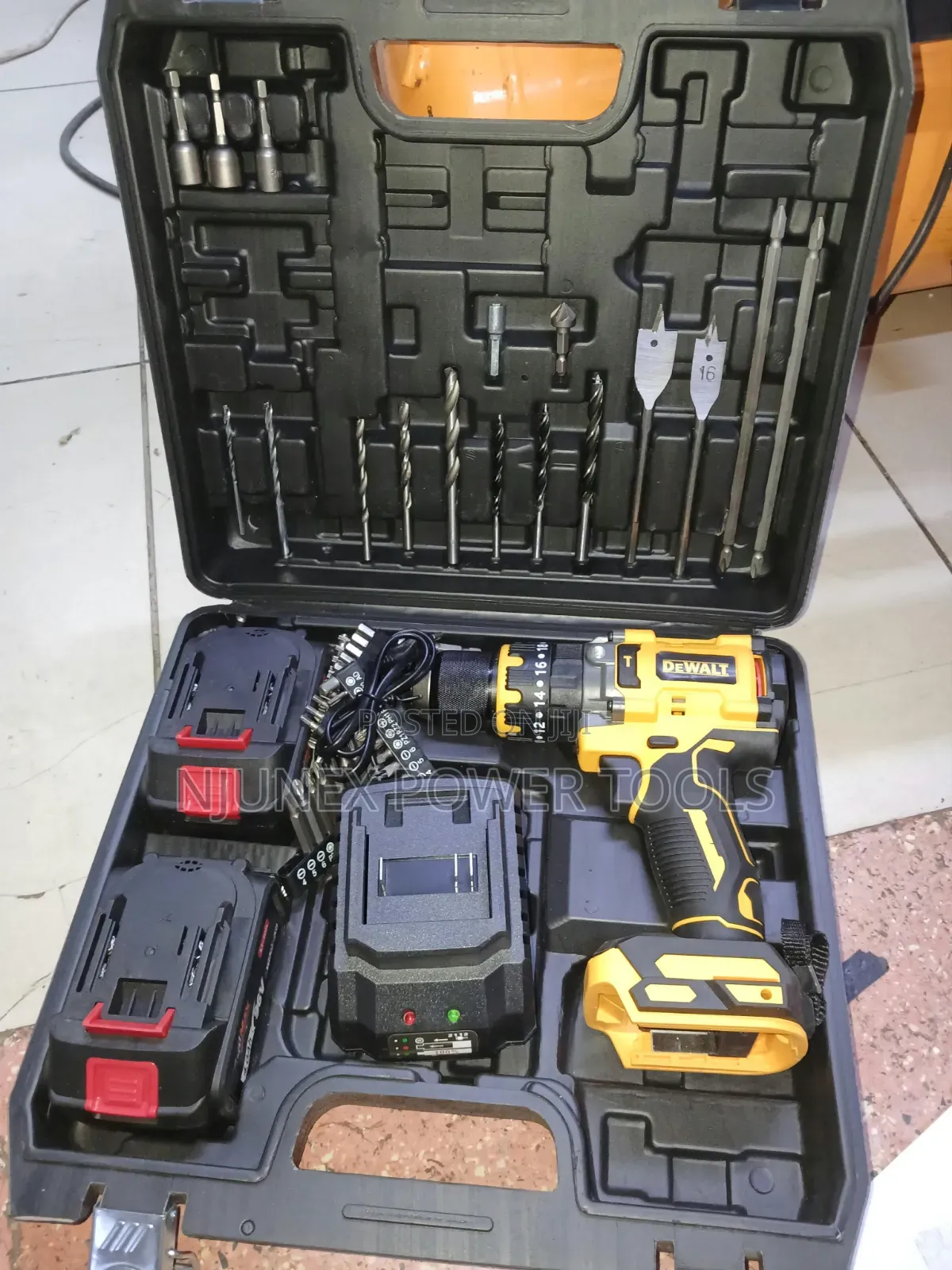 Cordless Drill Toolkit With a Yellow and Black DeWalt-branded Drill,