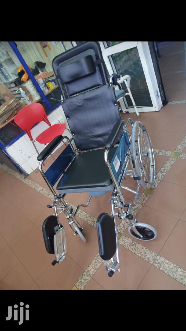 Reclining Wheel Chair (With A Toilet)