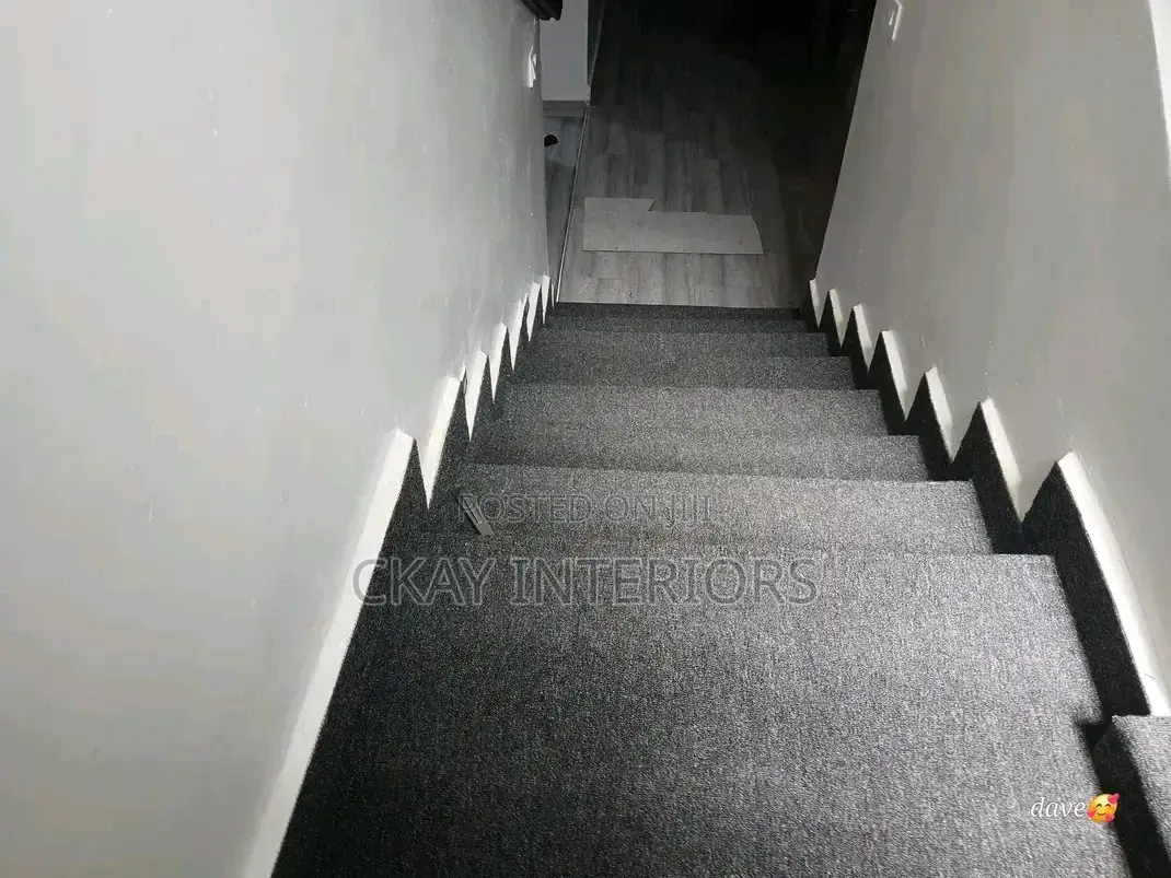 Grey and Red Interior Flooring With Delta Wall to Wall Carpets