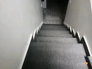 Grey and Red Interior Flooring With Delta Wall to Wall Carpets