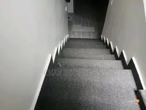 Grey and Red Interior Flooring With Delta Wall to Wall Carpets