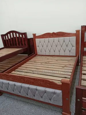 5 by 6 Brown Wooden Bed