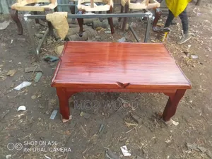 Warm Cherry Solid Wood Coffee Table With Sculpted Edge Detail
