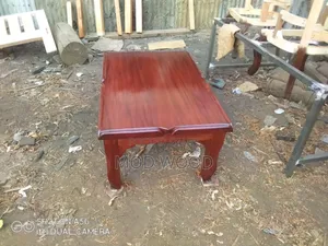 Warm Cherry Solid Wood Coffee Table With Sculpted Edge Detail