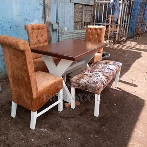 Modern Trestle Dining Set With Tufted Chairs and Patterned Bench
