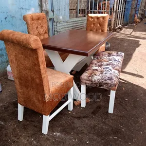 Modern Trestle Dining Set With Tufted Chairs and Patterned Bench
