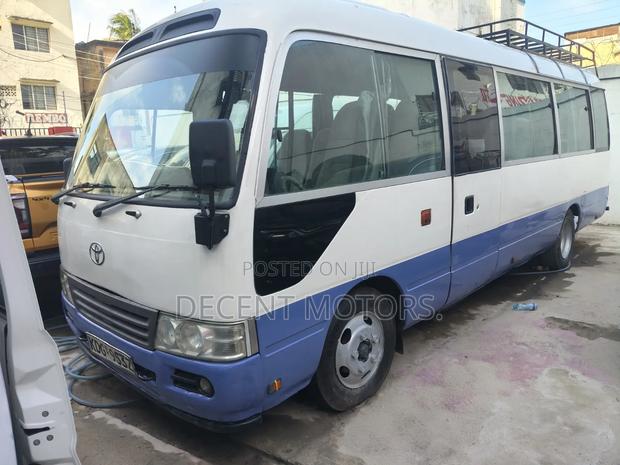Toyota Coaster 2014 White - thumbnail 3