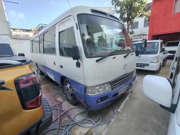 Toyota Coaster 2014 White - thumbnail 2