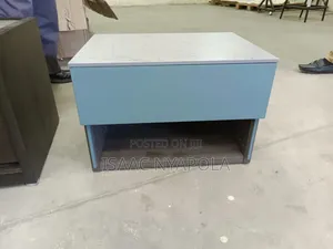 Elegant Blue and Grey Bedside Cabinet With Open Shelf and Drawer.