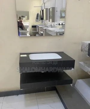 Wall Hung Cabinet and Mirror.