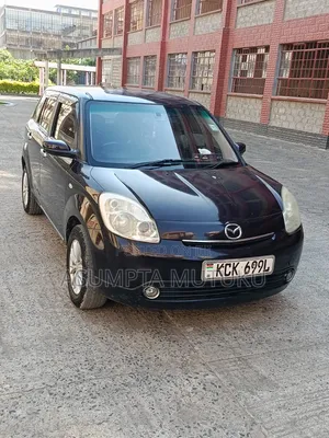 Mazda Verisa 2009 Burgundy