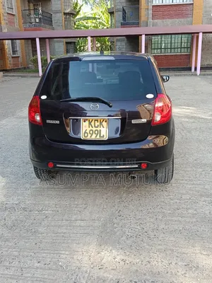 Mazda Verisa 2009 Burgundy