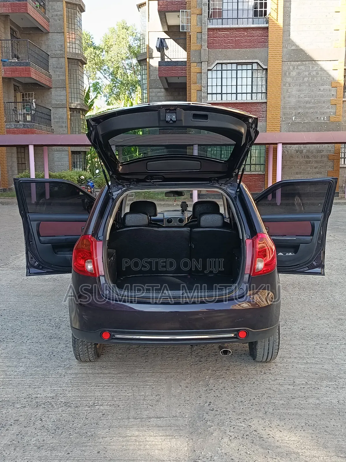 Mazda Verisa 2009 Burgundy