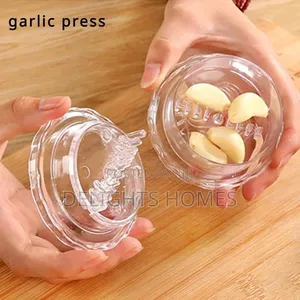 Multifunction Twist Garlic Masher, Peeler Kitchen Ginger Crusher -Bli