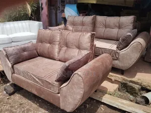 3 and 2 Briwn Butterfly Sofas