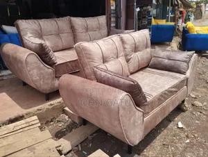 3 and 2 Briwn Butterfly Sofas