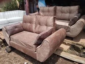 3 and 2 Briwn Butterfly Sofas