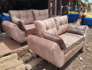 3 and 2 Briwn Butterfly Sofas