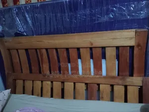 5 by 6 Wooden Bed and Tuffoam Heavy Duty Mattress