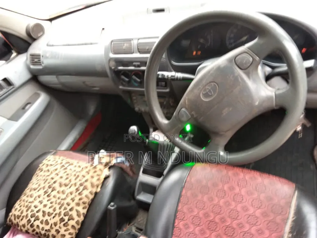 Toyota Starlet 1999 Red
