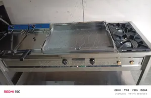 Classic Cooker Has Imported Griddle, Deep Fryer and Imported Grills