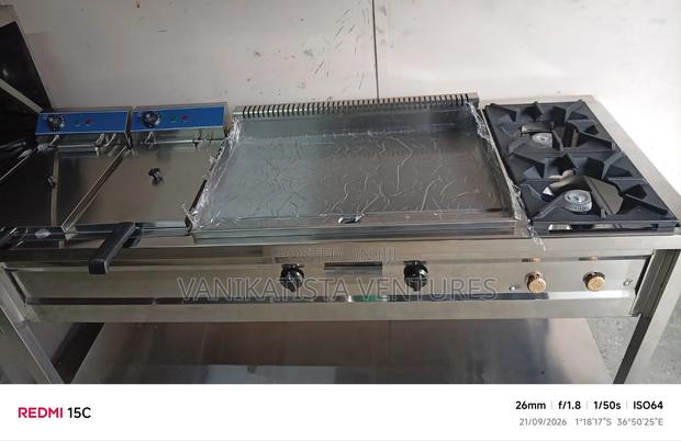 Classic Cooker Has Imported Griddle, Deep Fryer and Imported Grills