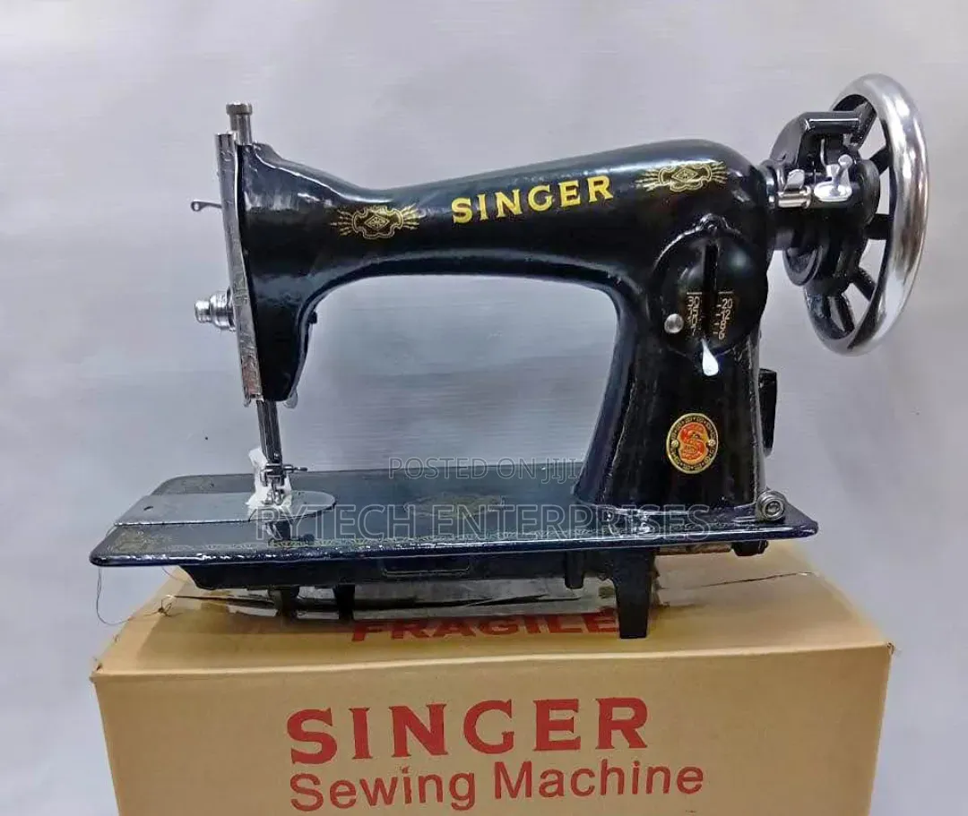 Singer Sewing Machine + Stand