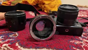 Canon M50 + Kit Lens + 50MM Lens (With Adapter)