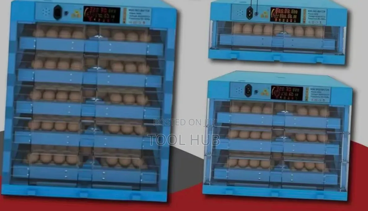 Blue Automatic Egg Incubator With a Rolling Tray System.