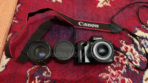 Canon M50 + Kit Lens + 50MM Lens (With Adapter)