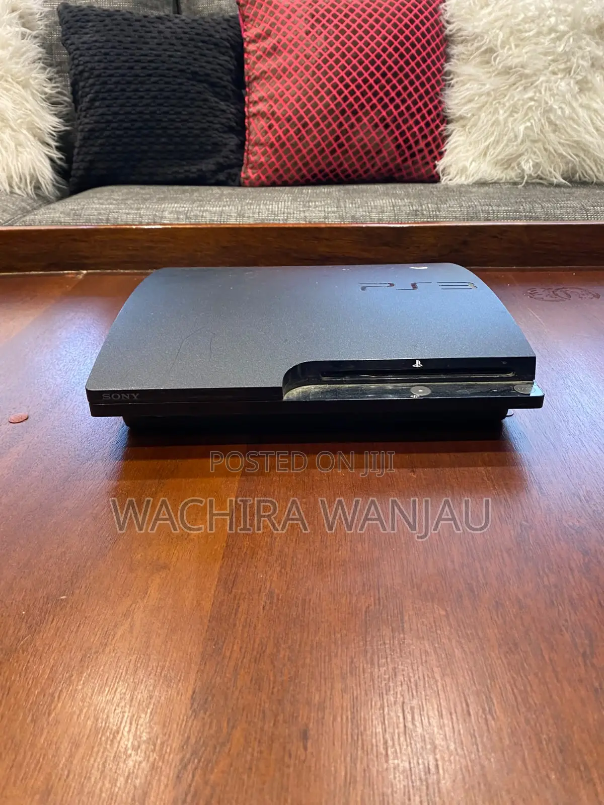 Playstation 3 Slim Console and 2 Dualshock 3 Controllers (Unchipped)