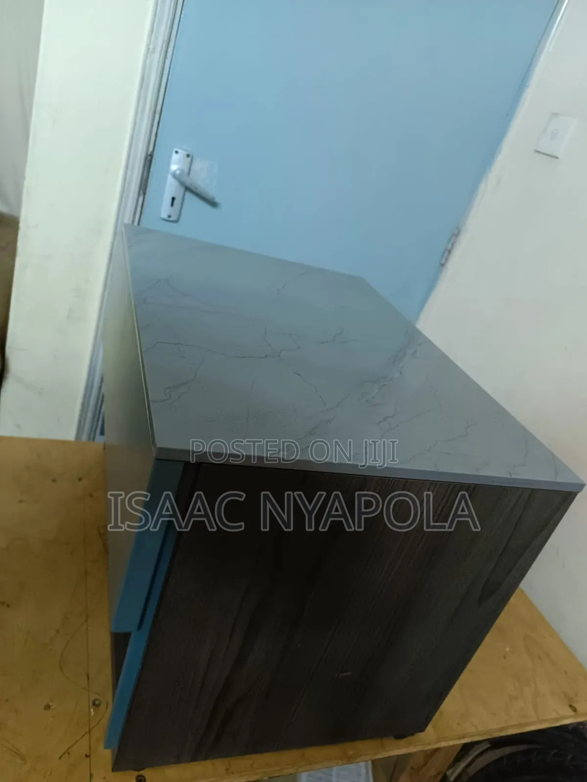 Elegant Blue and Grey Bedside Cabinet With Open Shelf and Drawer.