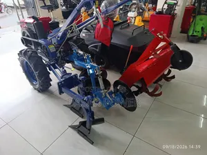 10hp Walking Tractor With Attachments.